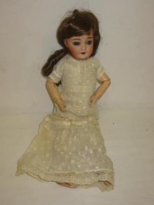 Appraisal: A Limoges bisque Cherie doll with blue sleeping eyes open