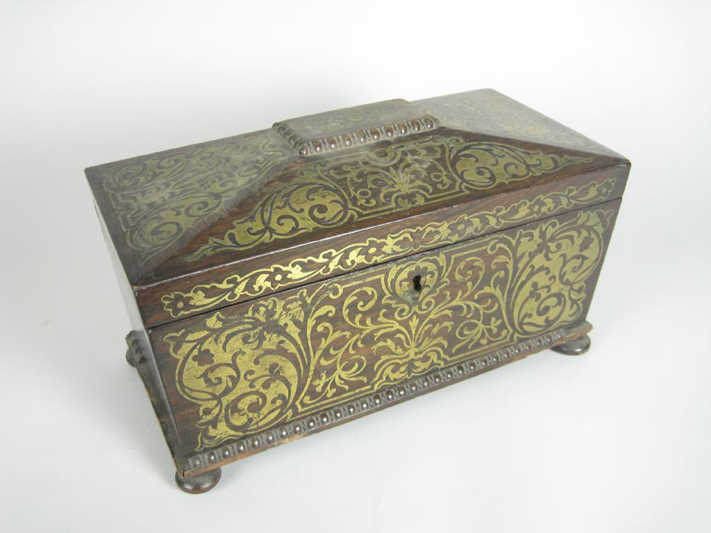 Appraisal: A Regency mahogany Tea Caddy of sarcophagus shape with brass