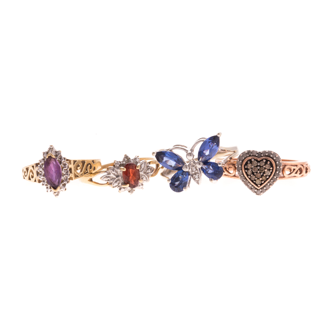 Appraisal: Four Lady's Gemstone Rings in K K white gold ring