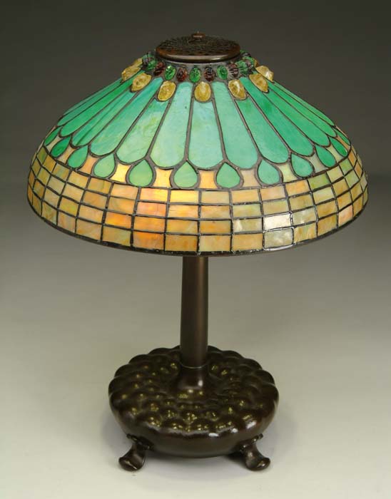 Appraisal: TIFFANY FEATHERED JEWEL TABLE LAMP Strong green feathers on deep