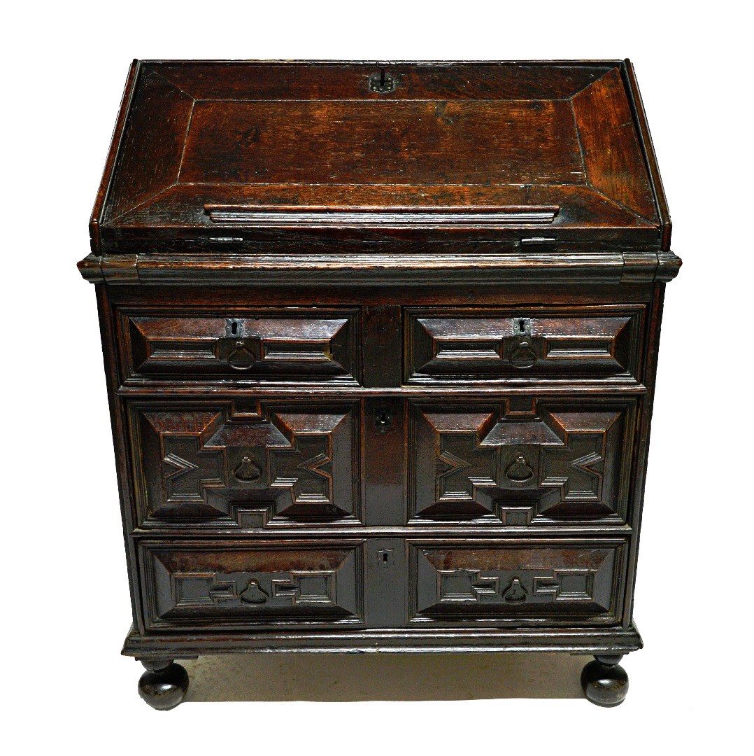 Appraisal: A th century oak bureau the fall enclosing a stepped