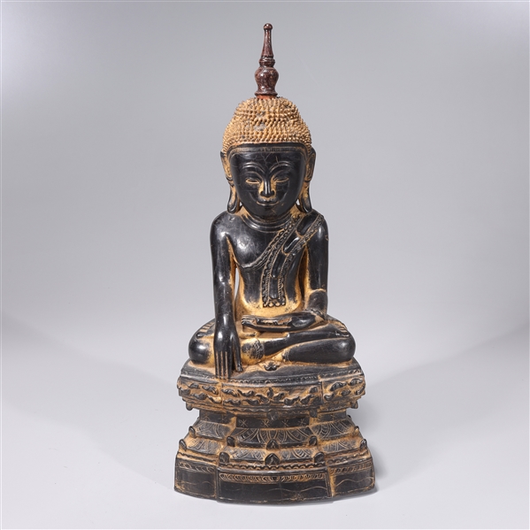 Appraisal: Antique Thai black and gilt lacquer seated figure of Buddha