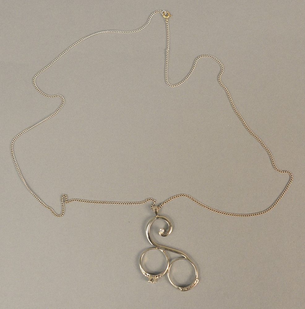 Appraisal: Custom K gold necklace made of two rings with small