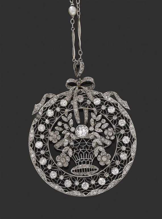 Appraisal: DIAMOND PENDANT WITH CHAIN France ca Platinum Very decorative round