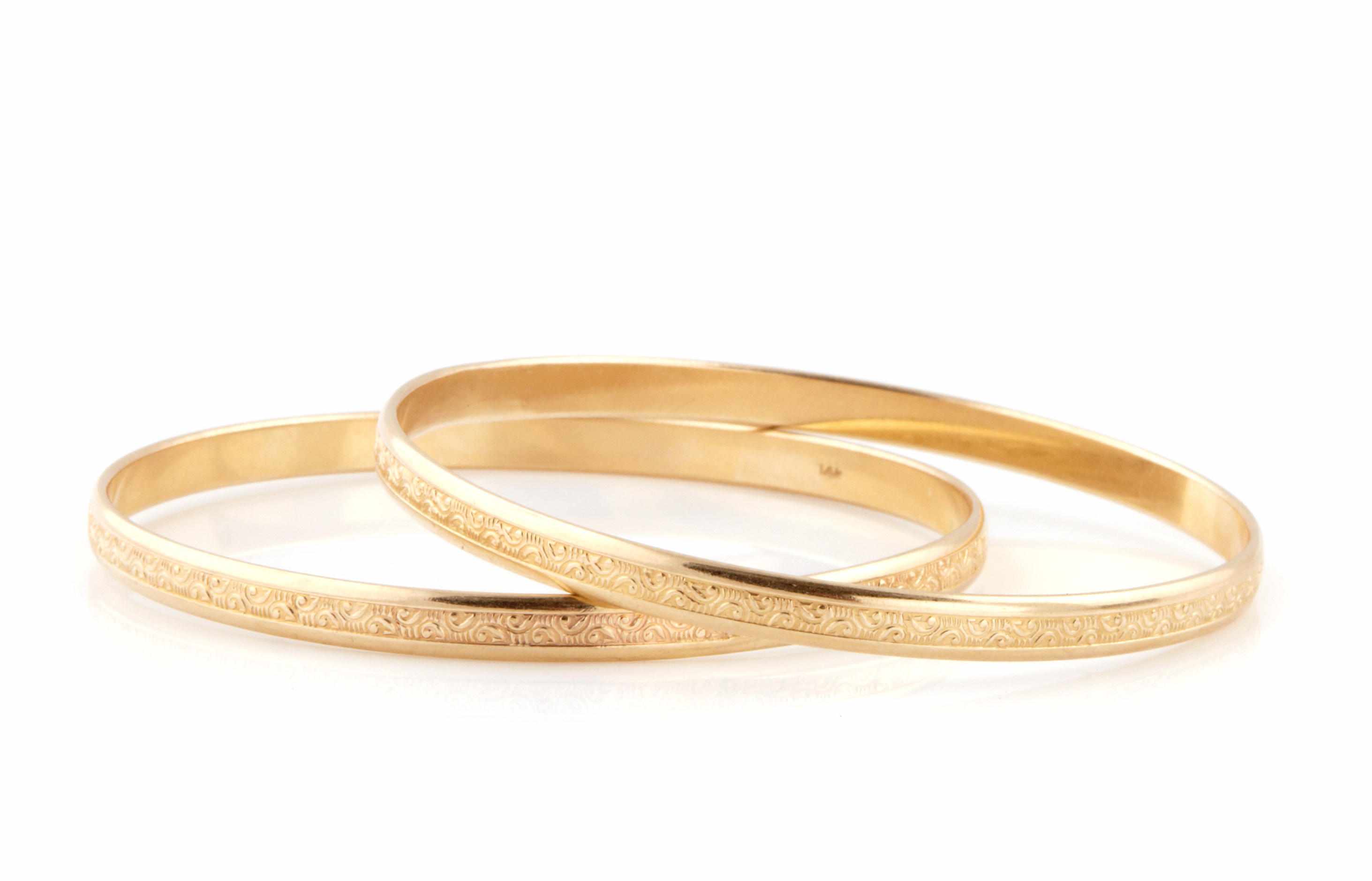 Appraisal: A pair of k gold bangles diameter in g gross