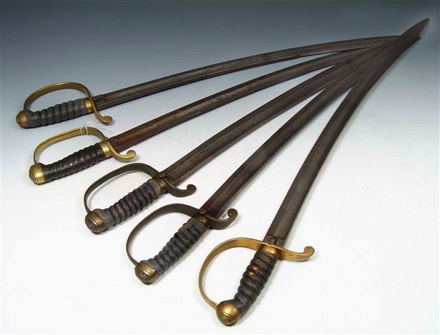 Appraisal: A GROUP OF FIVE MID VICTORIAN 'HANGER' SWORDS with shagreen