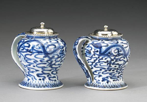 Appraisal: A pair of small blue and white porcelain handled mustard