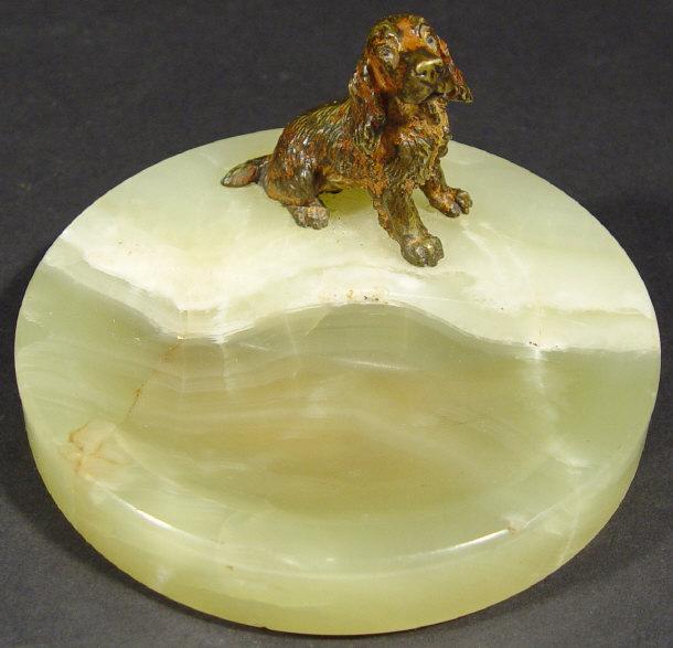 Appraisal: Cold painted bronze spaniel mounted on a green onyx ashtray