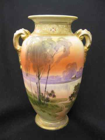 Appraisal: Nippon Handpainted Porcelain Vase fine satin landscape handled '' signed