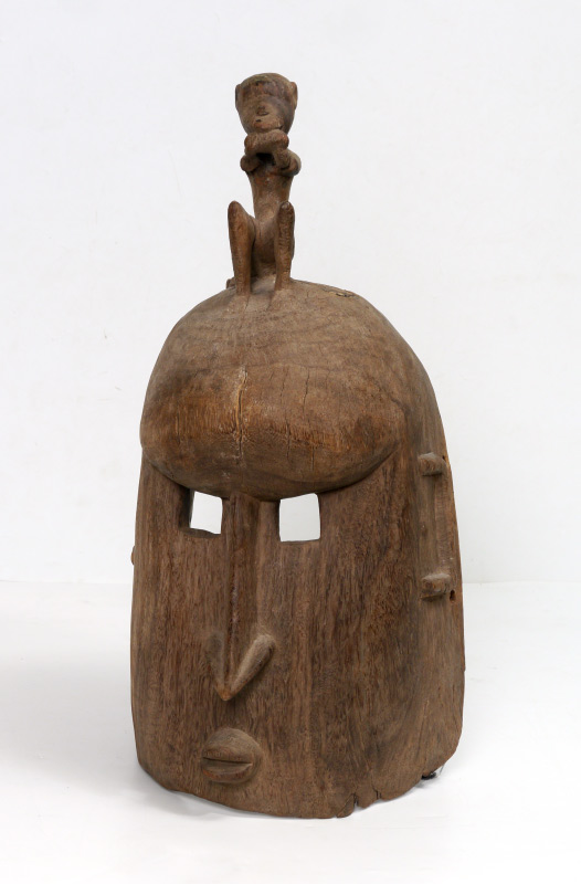 Appraisal: CARVED FIGURAL AFRICAN HELMET MASK Figure of a seated man