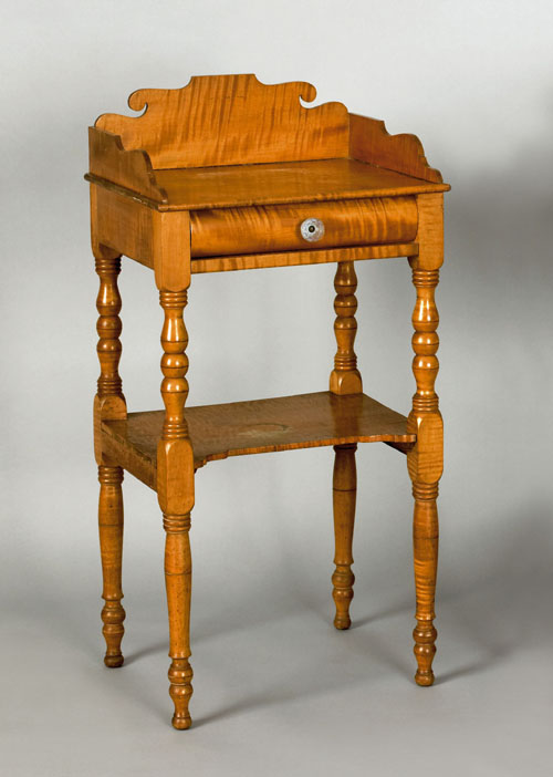 Appraisal: Pennsylvania Sheraton curly maple washstand mid th c with scalloped