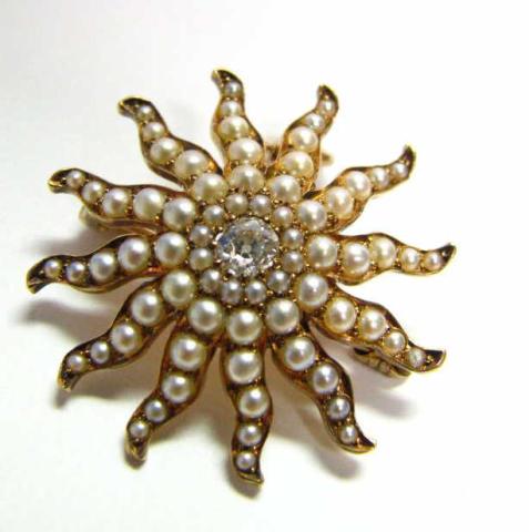 Appraisal: Yellow gold seed pearl and diamond starburst pin pendant