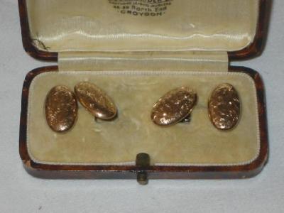 Appraisal: A PAIR OF CT ROSE GOLD CUFFLINKS comprising two oval