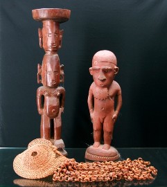 Appraisal: Two tribal carvings together with a PNG woven mask decorated