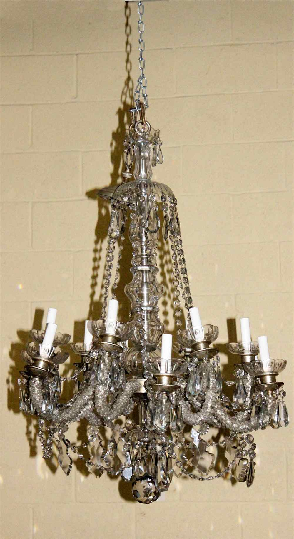 Appraisal: CONTINENTAL CRYSTAL CHANDELIER With branches fitted with curving bead-set arms