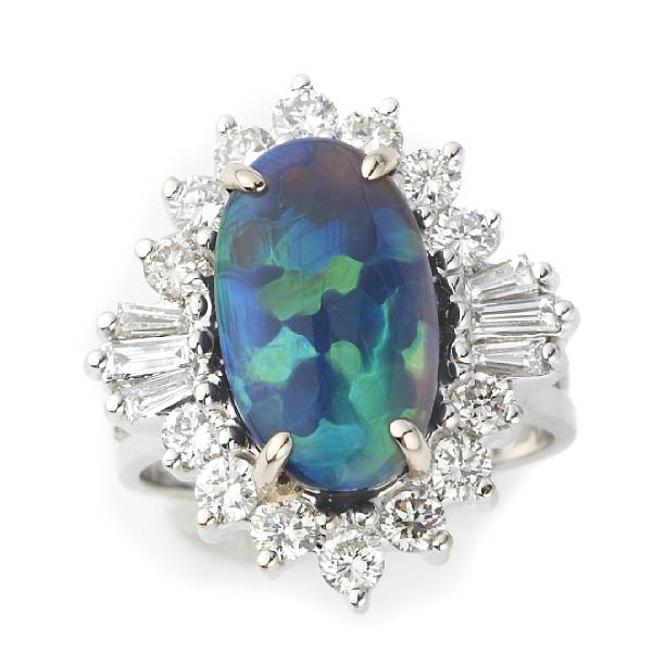 Appraisal: A black opal diamond and k white gold ring estimated