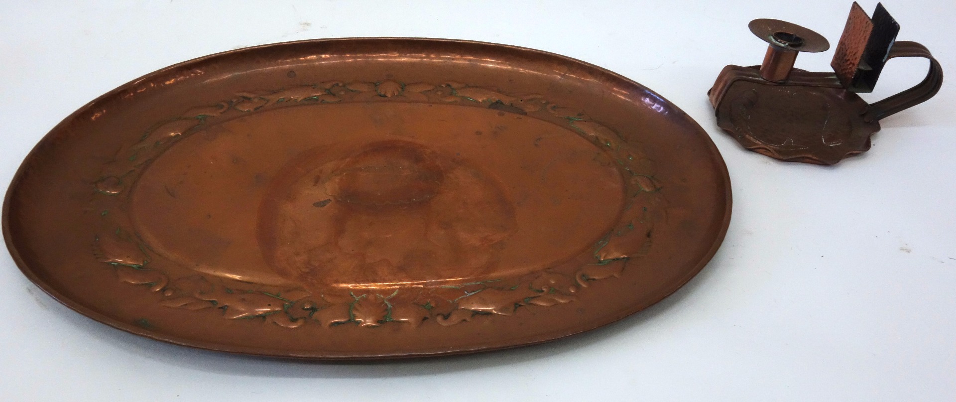 Appraisal: A copper oval tray probably Newlyn the raised centre with