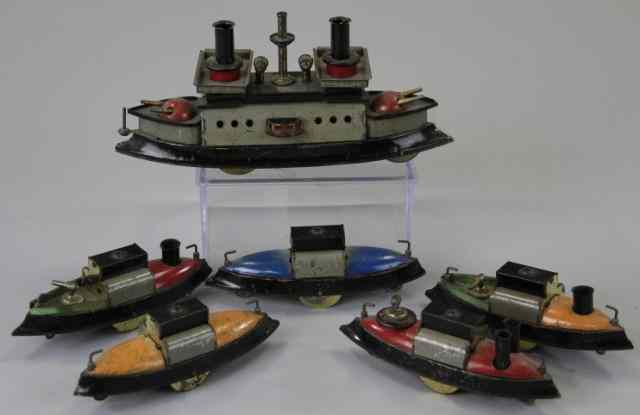 Appraisal: HESS BATTLESHIP FLEET C lithographed tin flotilla consists of large