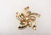 Appraisal: BROOCH - K yellow gold swirl motif retro bracelet with