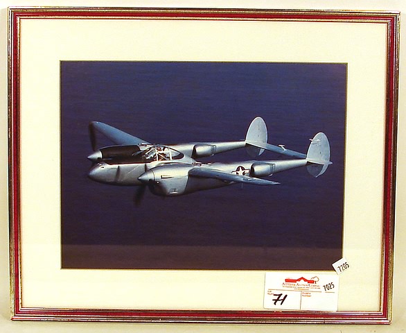 Appraisal: Framed and matted color photograph of a WWII period Lockheed