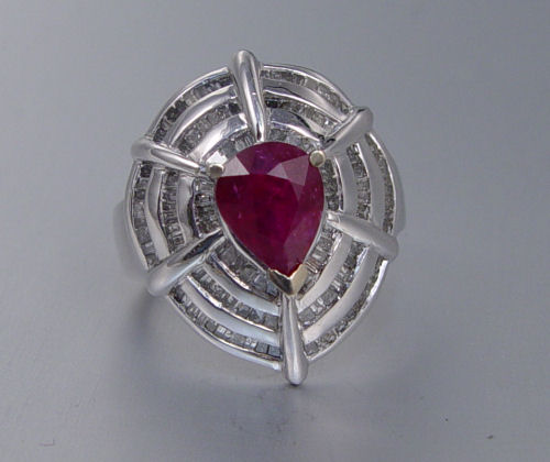 Appraisal: CT RUBY RING WITH DIAMONDS K white gold ring contains