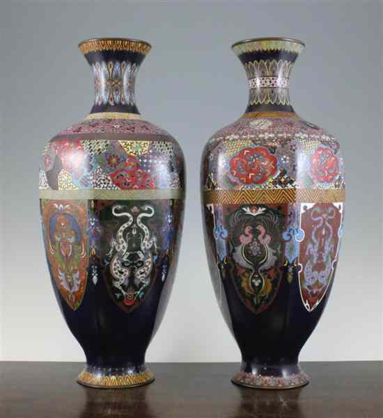 Appraisal: A pair of large Japanese cloisonne enamel hexagonal panelled vases