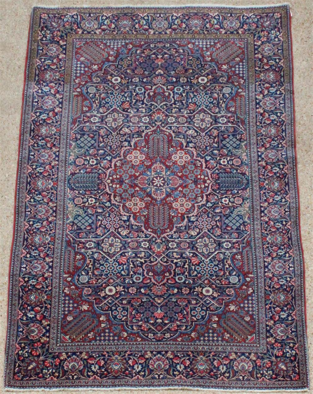 Appraisal: FLORAL ORIENTAL WOOL RUG cartouche medallion with all over design