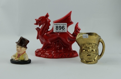 Appraisal: Royal Doulton Welsh dragon Sam weller bust and brass toby