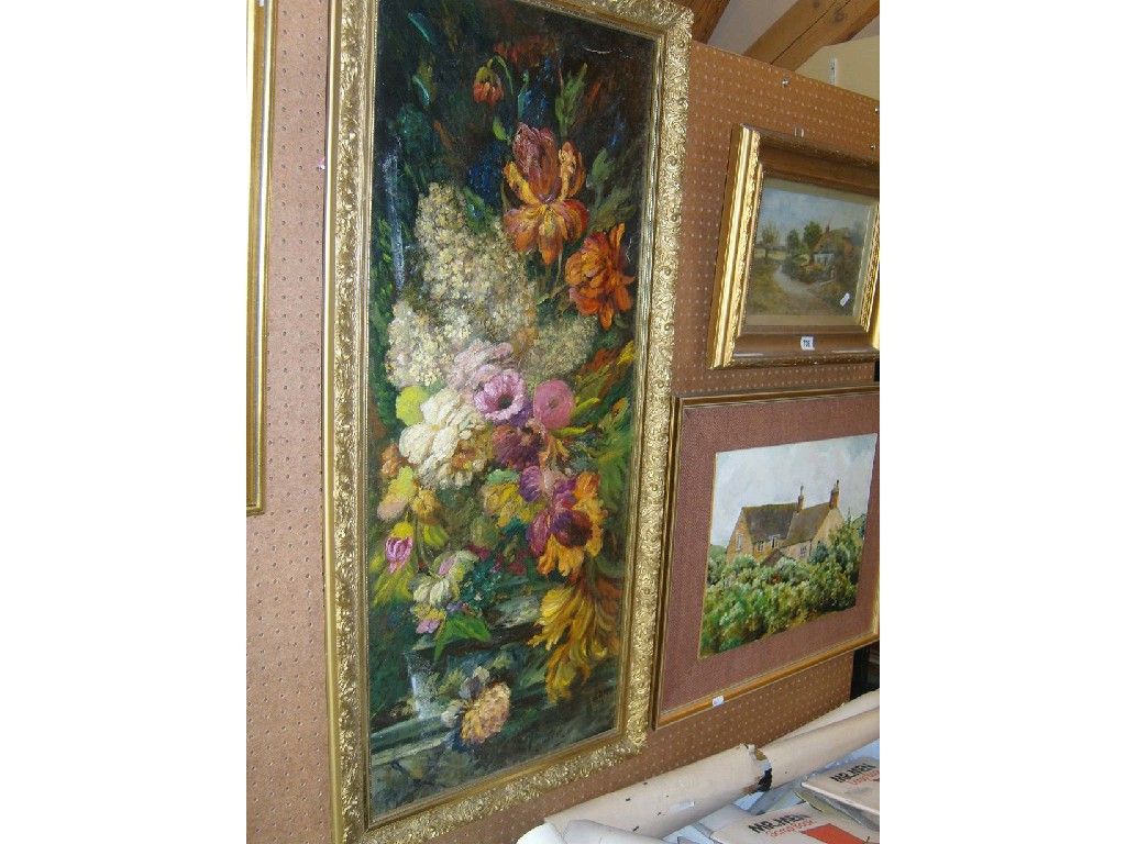 Appraisal: An oil painting on canvas of a floral still life