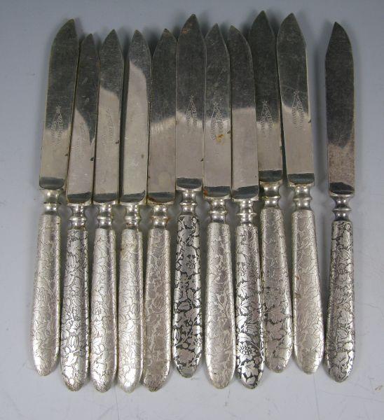 Appraisal: Set of Rogers Bros Silverplate Knives with acid etched floral