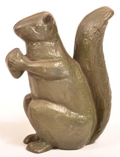 Appraisal: Hubley Cast Iron Squirrel Doorstop Hubley Cast Iron Squirrel Holding