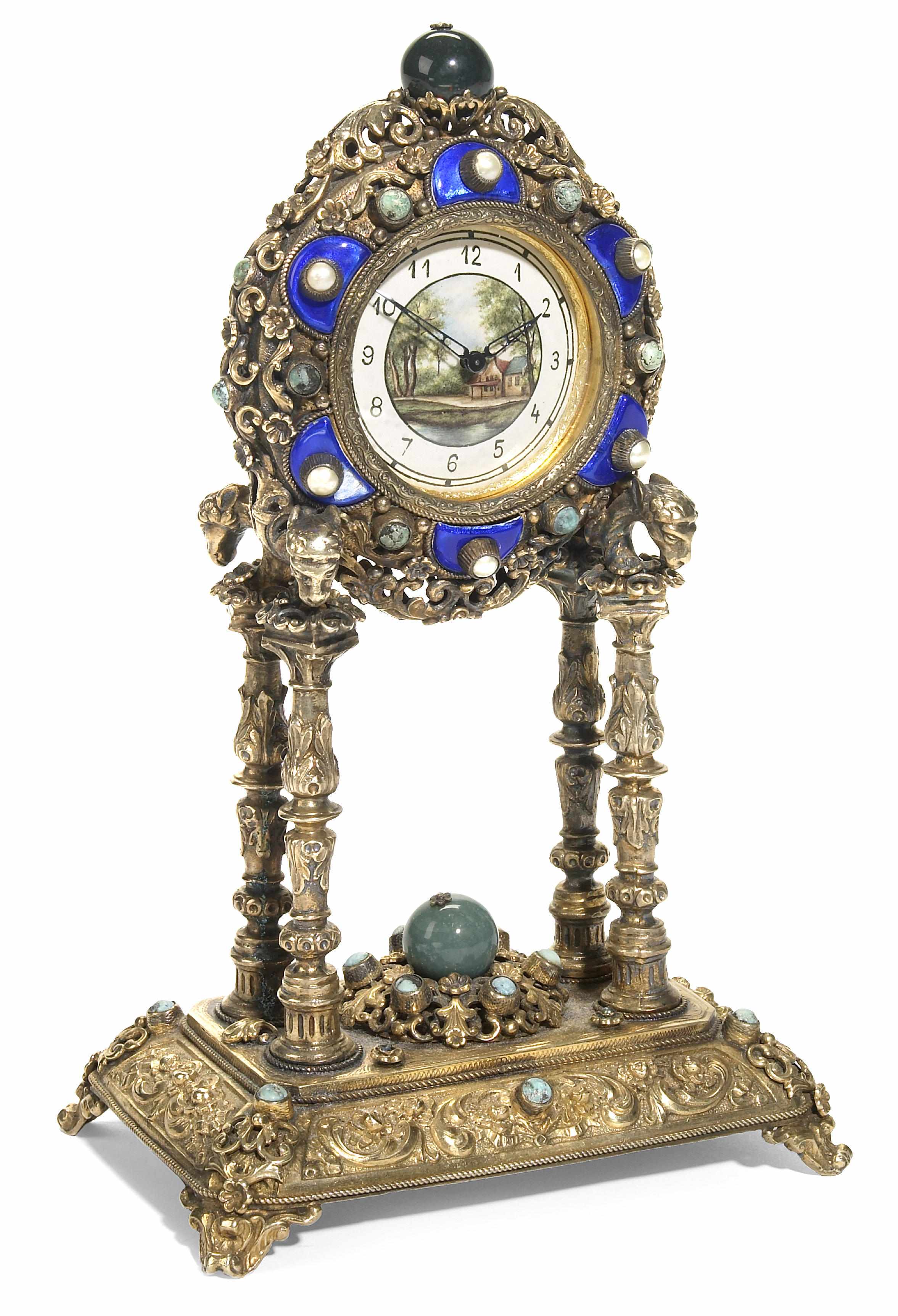 Appraisal: A Continental gem set gilt metal timepiece th century Set