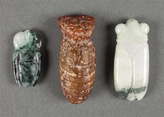 Appraisal: Three Chinese archaic style carved jade lucky pieces modeled as