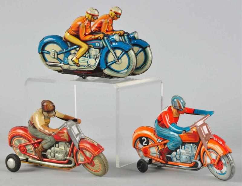 Appraisal: Lot of Tin Technofix Motorcycle Wind-Up Toy German Working Marked