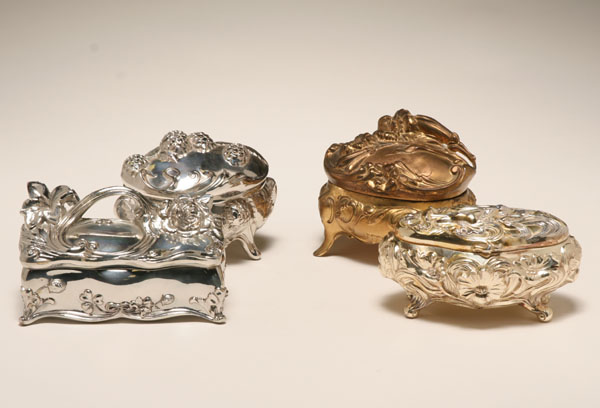 Appraisal: Four Art Nouveau dresser jewelry boxes Most silverplate with floral