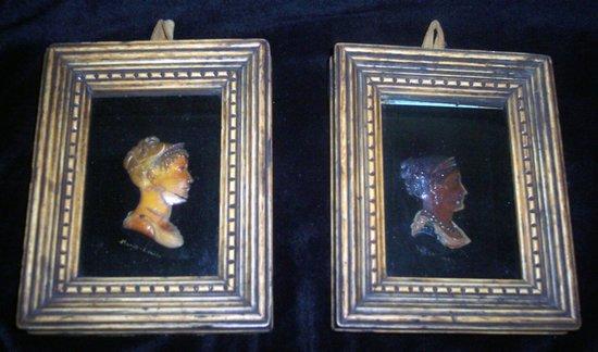 Appraisal: A pair of painted wax relief portraits Marie Louise and