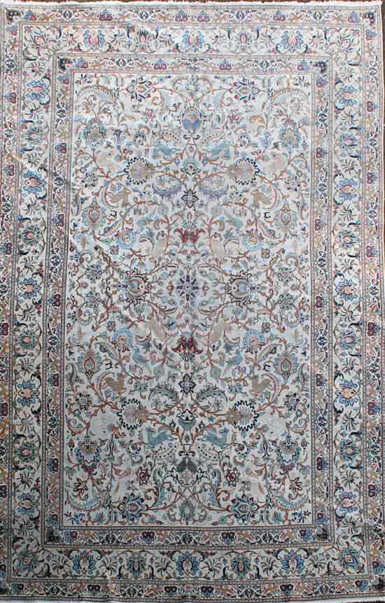 Appraisal: A Kashan carpet the ivory ground with extensive field of