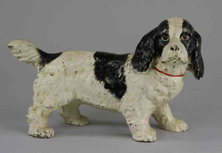 Appraisal: COCKER SPANIEL DOORSTOP Hubley cast iron full figured casting depicts