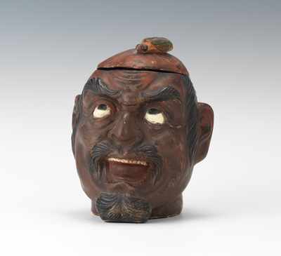 Appraisal: Asian Character Head Tobacco Jar Terracotta with pigments in matte