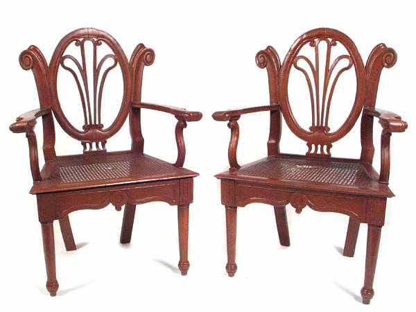 Appraisal: A pair of Art Nouveau style caned armchairs height in