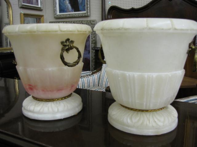 Appraisal: Pair of Carved Alabaster Urns with gilt bronze handles and