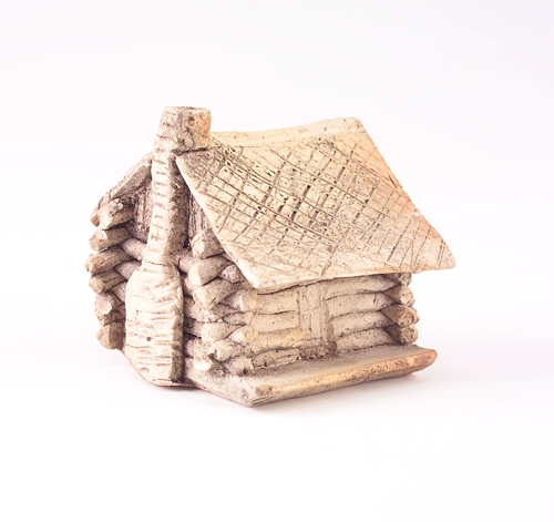 Appraisal: GEORGE OHR Log cabin novelty of unglazed white clay GEO