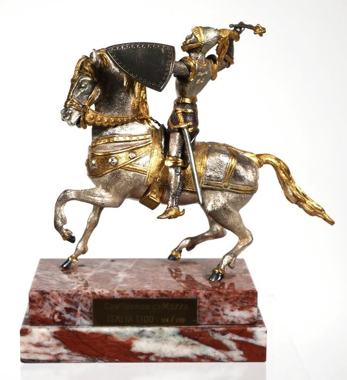 Appraisal: Silver and gilt bronze statue of a knight wielding a