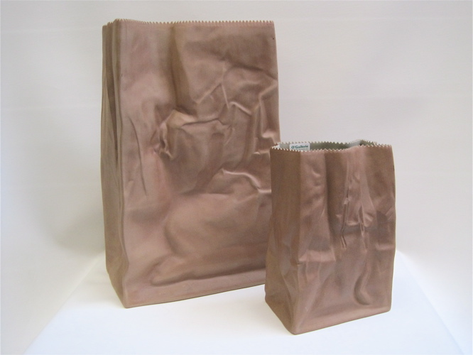 Appraisal: ROSENTHAL POTTERY GROCERY BAGS from their Studio Line brown exteriors