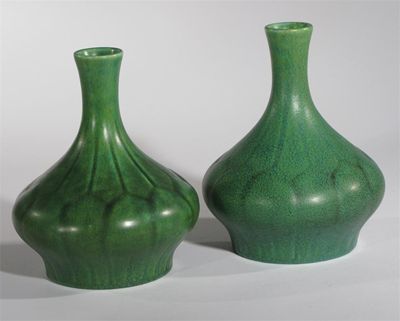 Appraisal: A pair of Pilkington's Lancastrian vases dated compressed form with