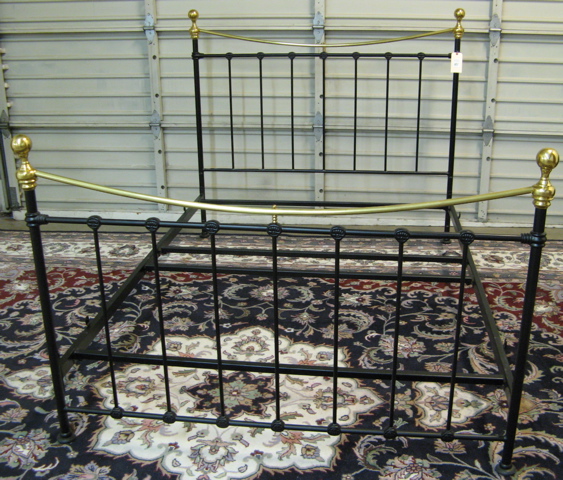 Appraisal: VICTORIAN STYLE BRASS AND IRON BED queen size the black