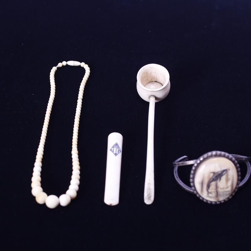 Appraisal: Lot of Alaskan Ivory whalebone items Cigarette filter Orca whale