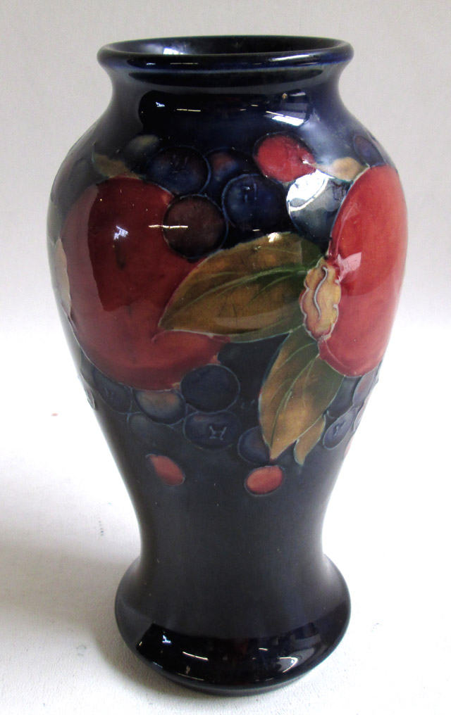 Appraisal: MOORCROFT POTTERY VASE hand painted under glaze in the Pomegranate