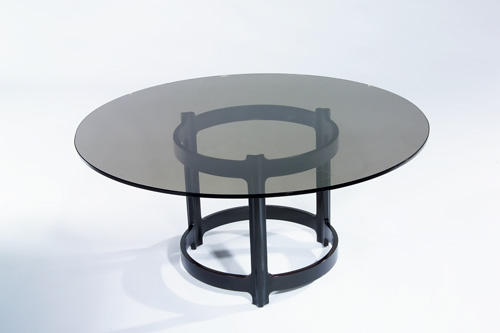 Appraisal: DUNBAR Side table with circular smoked glass top on ebonized