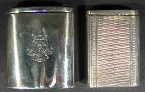 Appraisal: Two silver snuff boxes with sliding lids and engine turned